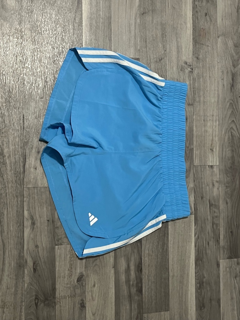 Adidas Light Blue Athletic Running Shorts with White Stripes